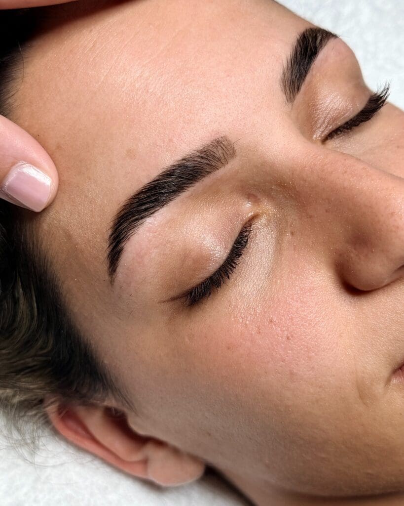 A woman receiving a facial at The Wellness Spot in Vero Beach, Florida
